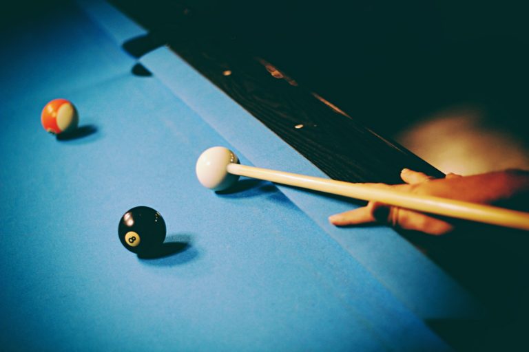 person playing billiard